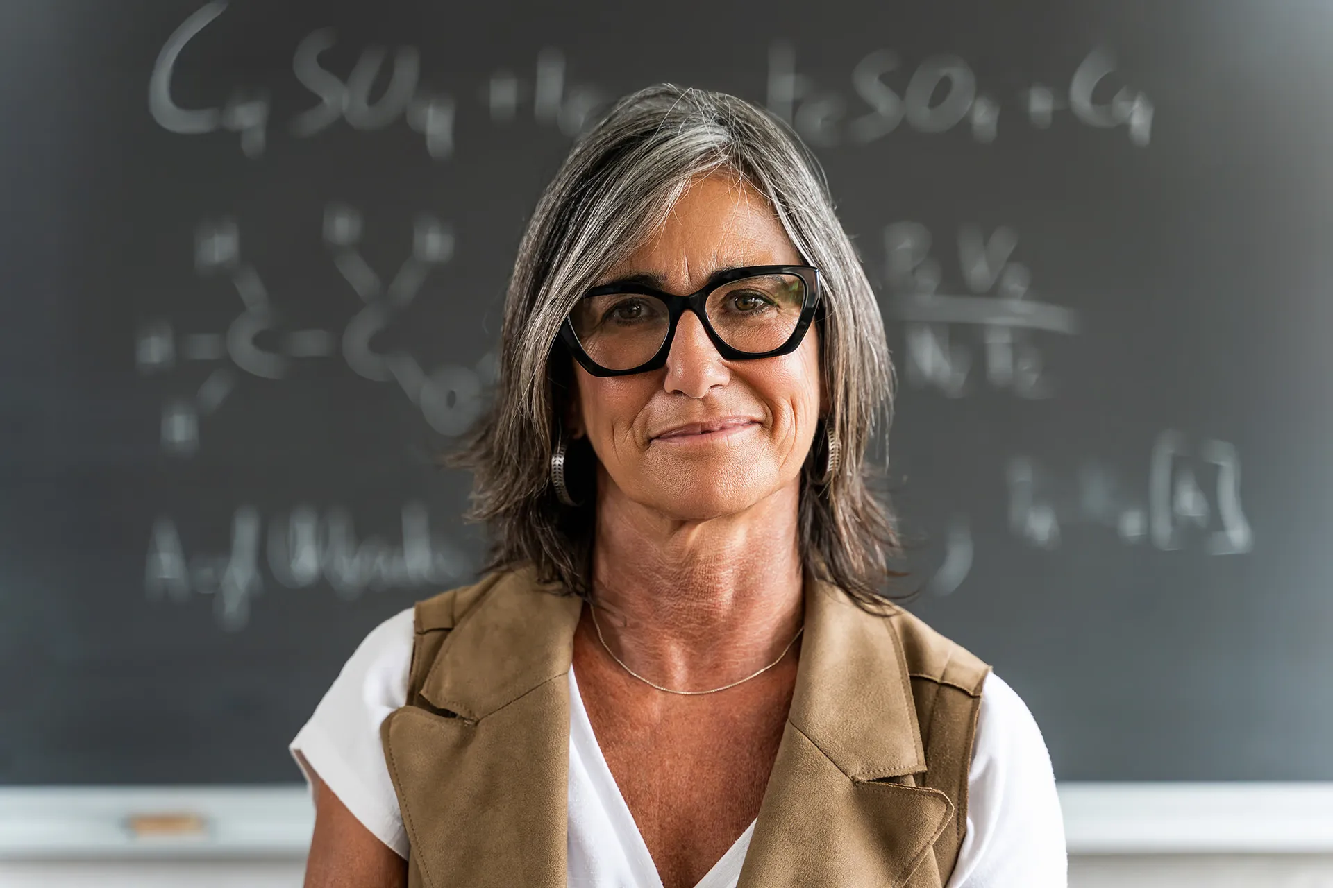 Professor smiling at the camera